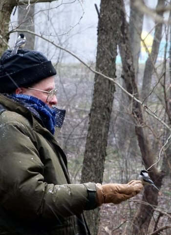 Ray Winstead with two Chickadees at Blue Spruce Park near Indiana, Pennsylvania December 26, 2012